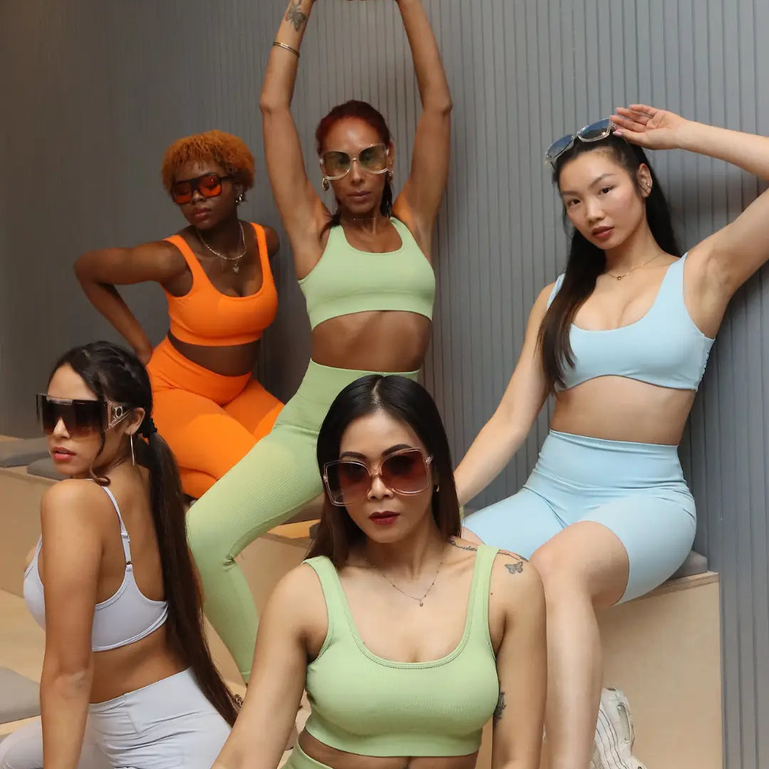 group of women in colourful activewear