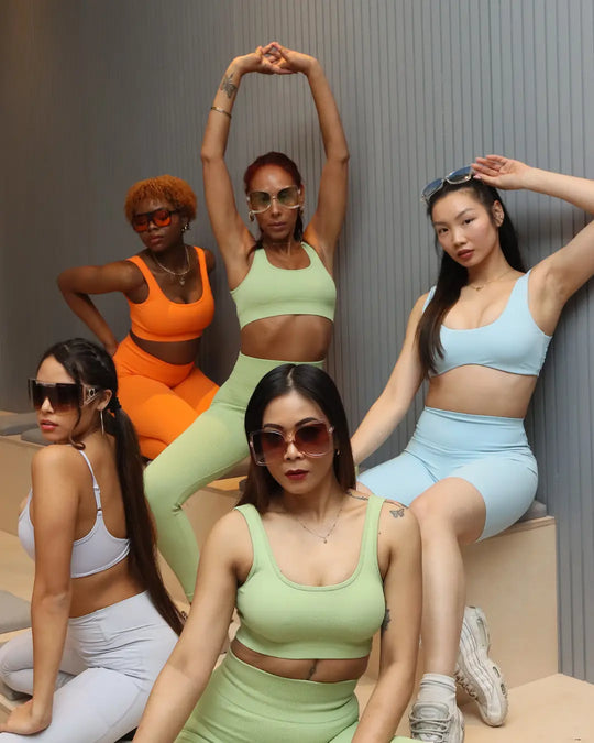 group of women in colourful activewear