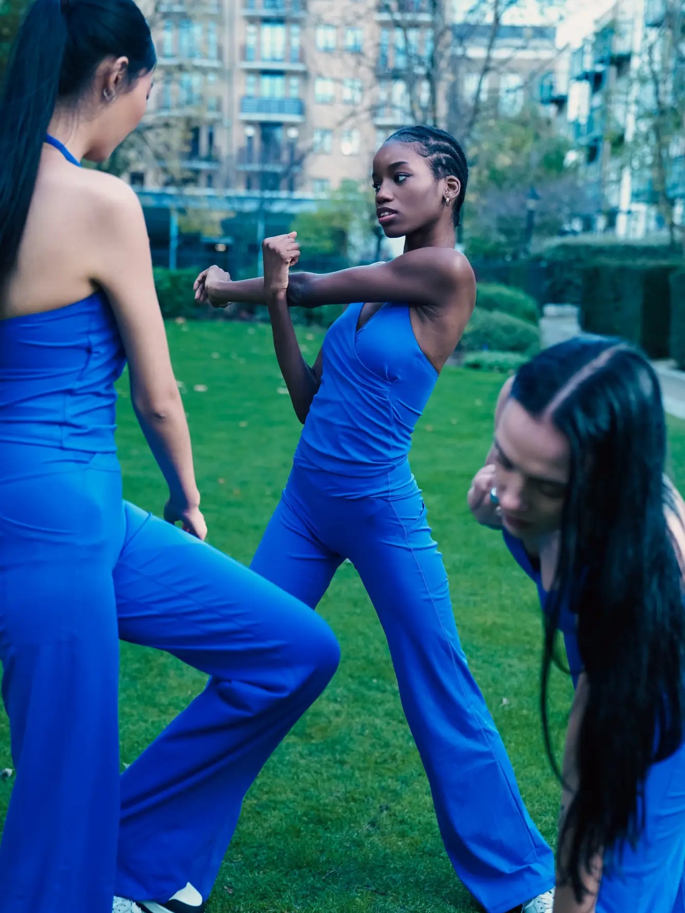 tall models wearing yemzi royal blue halter top and wide leg pants