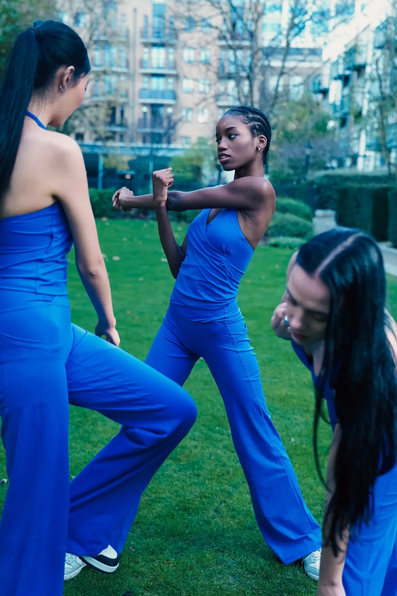 tall models wearing yemzi royal blue halter top and wide leg pants