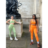 Models wear yemzi sculpting ribbed set outside Tate Britain 