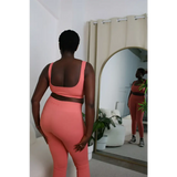 African Model in Guava pink ribbed bra and leggings