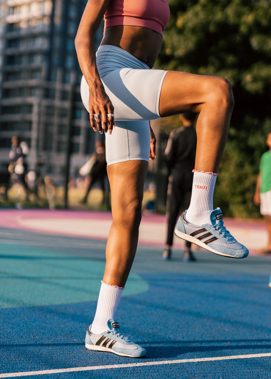 Person in athletic wear on a running track