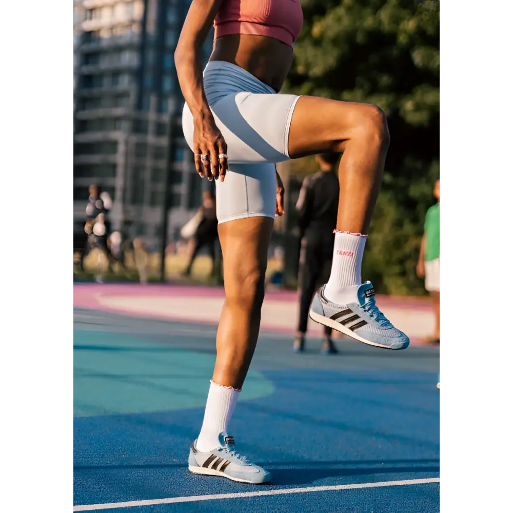 Person in athletic wear on a running track