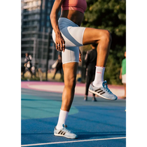 Person in athletic wear on a running track