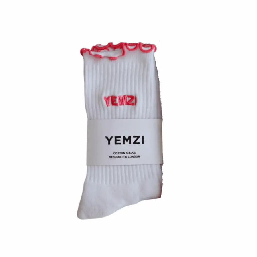 White sock with piink trim and 'YEMZI' branding on a white background