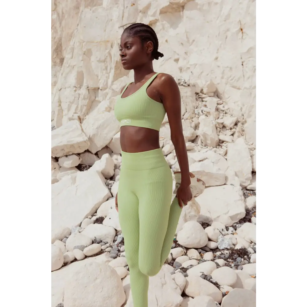 Model wearing Yemzi Sage green two piece set activewear - stretch