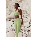 Model wearing Yemzi Sage green two piece set activewear - stretch